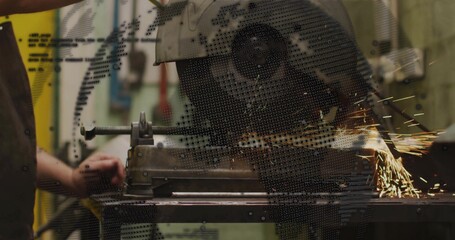 Cutting man using abrasive cutoff saw at shop, in dark shirt, clamping workpiece in vise, sparks