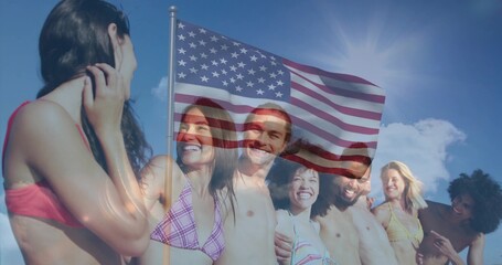 Smiling group of adults posing at beach, wearing bikinis, swim trunks, American flag overlay, sun