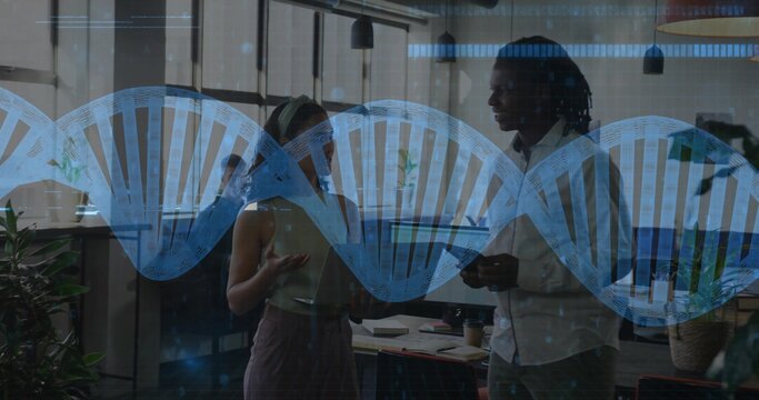 Standing two colleagues discussing project in open-plan office, wearing office clothes, DNA overlay