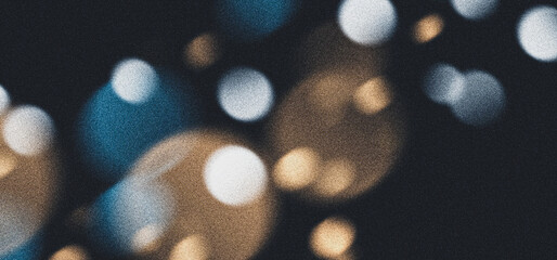 Bokeh grainy background, golden blue confetti glowing particles for party invitation poster, holiday season greeting cards designs © AdGraphics
