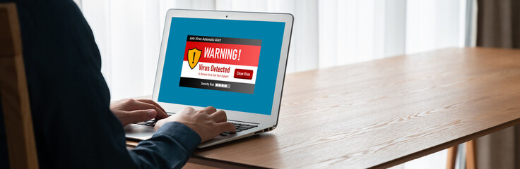 Virus warning alert on computer screen detected modish cyber threat , hacker, computer virus and malware © InfiniteFlow