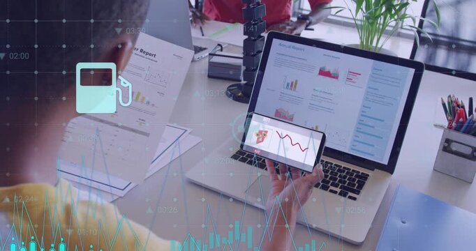 Analyst holding phone over laptop swiping revealing chart while waveform and icons aiding business