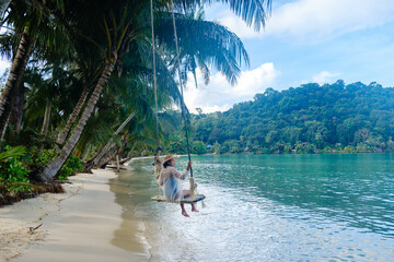 Tranquil swing on a tropical beach at Koh Kood Island, Thailand