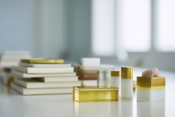 organized office desk with focus on acrylic items and note board featuring ar blurred white text bars