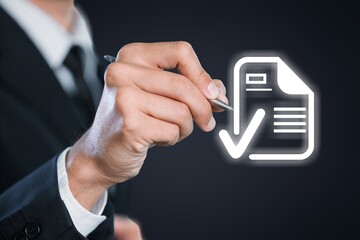 Businessman hold icon of checking document