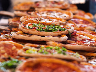 Delicious Variety of Gourmet Pizzas on Display