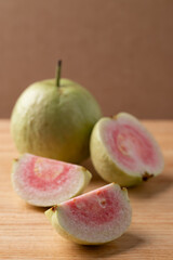 Red guava on wooden background, Tropical fruit high vitamin C