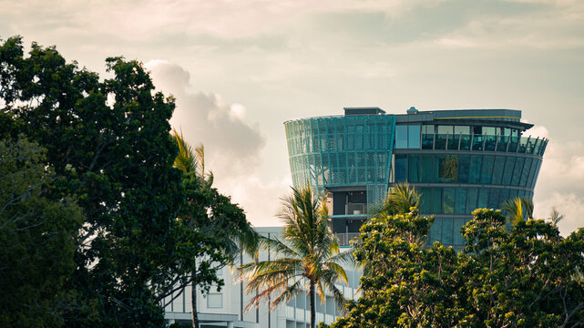 Modern Glass Tower at Golden Hour - Powered by Adobe