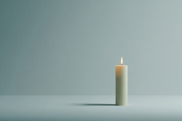 icon illuminated by soft warm glow of candle against clean minimalist white canvas background
