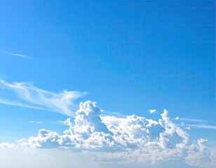Puffy cloud cluster in bright blue sky