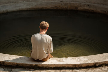 mesmerizing dance of water droplets on smooth glass surface against clean ultrabright background