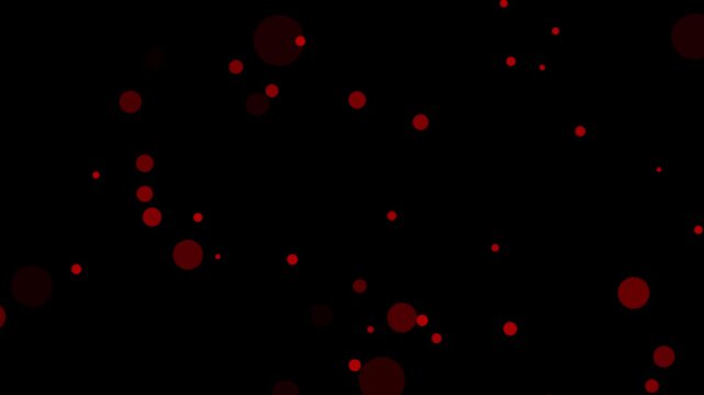 Red circular shapes of varying sizes and opacity scattered across a black background red circles bokeh