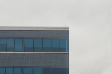 Corner of an Office Building Againt Gray Winter Sky
