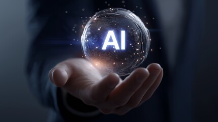 A close-up of a human hand holding a glowing orb with the letters AI represents artificial intelligence, innovation, and modern digital technology. The futuristic lighting emphasizes progress, science