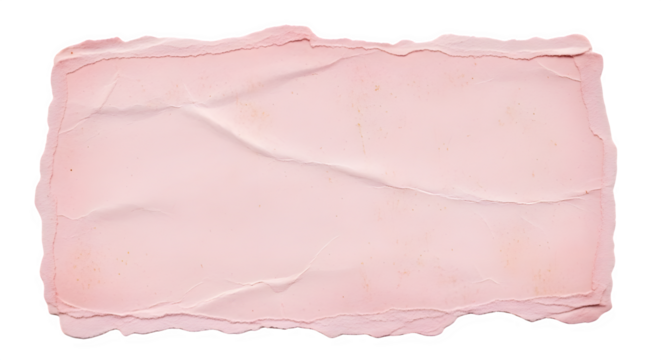 A rectangular piece of pink paper with rough edges and visible creases on a black background