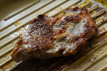meat steak grill on pan in the kitchen