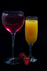 glass of red wine and orange juice