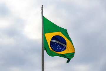 Brazilian flag waving in the wind Rio de Janeiro Brazil.