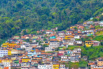 Fototapeta premium Mountains with favelas houses tropical nature Angra dos Reis Brazil.