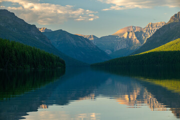 Ripples In Bowman Lake And The Mountains In The Distance