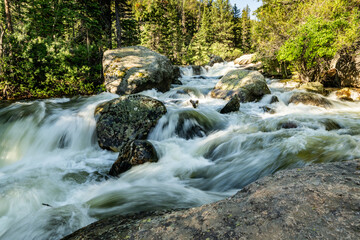 Rushing Snow Melt Rushes Through Creek In Rocky Mountain
