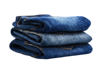 Stack of folded, faded, indigo blue denim jeans