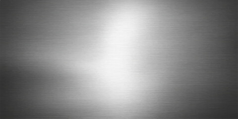 Shiny brushed silver metal plate background with a stainless steel texture and light reflection