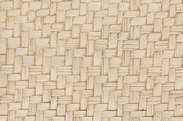 Old bamboo weaving pattern, woven rattan mat texture for background and design art work.