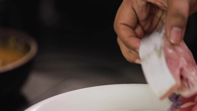 closeup shot of preparing hilsa fish curry.
