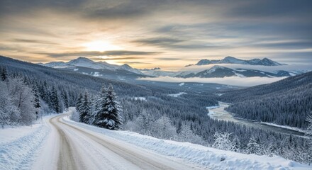 Winter Mountain Road Winding Through Snowy Valley at Sunrise