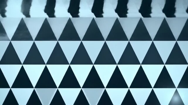 Repeating pattern of black and pale triangles, with lighting creating a unique depth effect