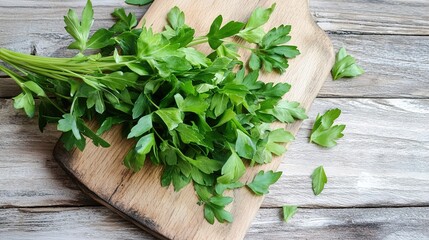 lovage. Freshly chopped lovage leaves on a rustic wooden cutting board, bright green color and texture. menu design, packaging mockups, designed for culinary blogs and recipe cards for restaurants.