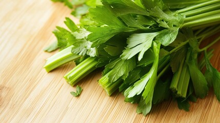 lovage. Freshly chopped lovage leaves on a rustic wooden cutting board, bright green color and texture. menu design, packaging mockups, designed for culinary blogs and recipe cards for restaurants.