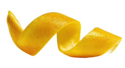 Twisted bright yellow citrus peel against a dark background