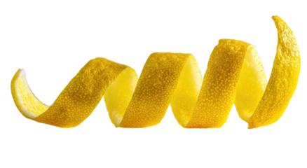 Bright yellow citrus peel twisted into a decorative spiral against black