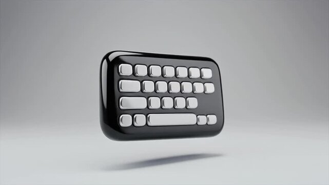 A minimalist 3D rendered black computer keyboard icon with white keys floating on a light grey background.