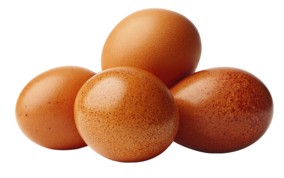 Four brown speckled eggs stacked and isolated on a black background