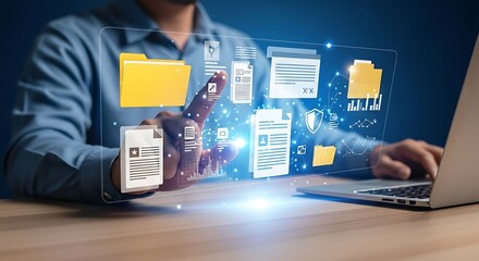 Businessman using laptop with virtual screen interface for online document management and data analysis, digital marketing, and cloud computing