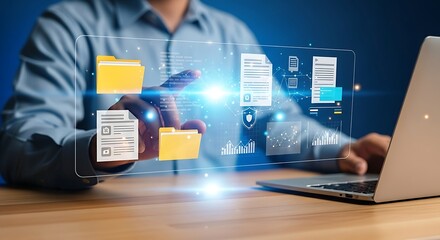 A business person using a laptop to access a digital file management system for document organization and efficiency