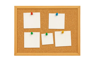 Empty wooden bulletin board with five blank cork notices pinned with colorful pushpins in red, blue, green, and yellow