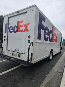 FedEx Delivery Truck Parked on Street