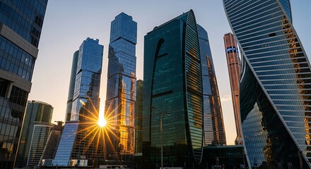 Modern Skyscrapers Towering Under the Golden Sunrise Sky