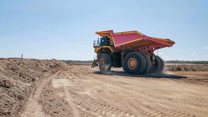 Construction machinery working in open pit mine