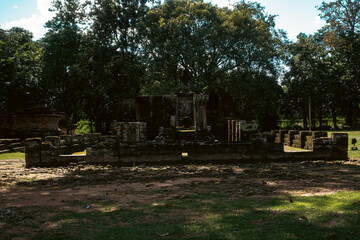 Monumental Buddha image Phra Atchana in subduing mara posture at Wat Sri Chum temple Sukhothai Historical Park, ancient stuccoed brick sculpture, thailand cultural heritage landmark