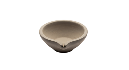 Small laboratory crucible for heating substances isolated on transparent background, used in chemistry and metallurgy experiments