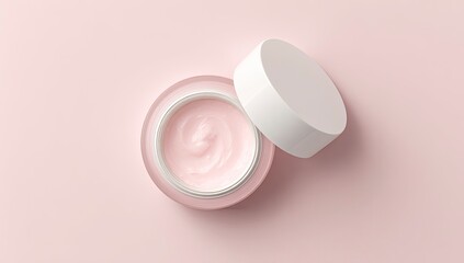 Pink skincare cream jar, open lid, top view