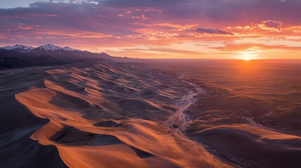 Aerial View Of Sunset Over Desert Landscape With City Skyline And Golden Hues