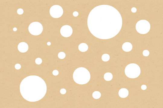 Cardboard texture with varying size transparent circular holes, paper cutout polka dot pattern, creative background