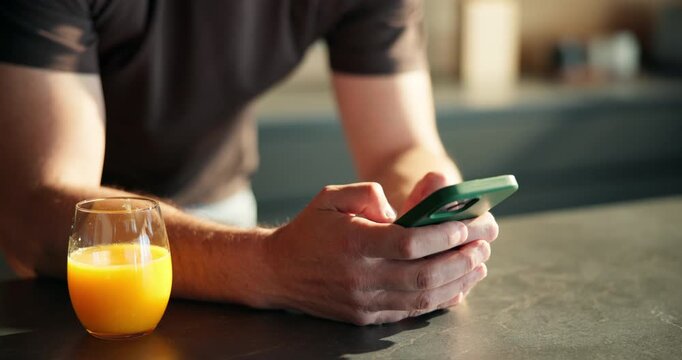 Phone, hands and freelancer with man in kitchen for networking, project consultant and talking. Virtual advisor, discussion and planning with person typing in home for remote worker and chat