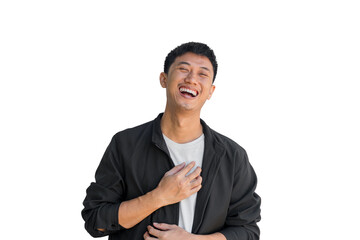 Young Asian man in black coat laughing happily on white background. Happiness concept. Positive energy. Good mood person. Funny. Thai man.